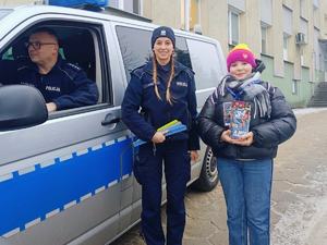 Policjanci z wolontariuszami Wielkiej Orkiestry Świątecznej Pomocy.